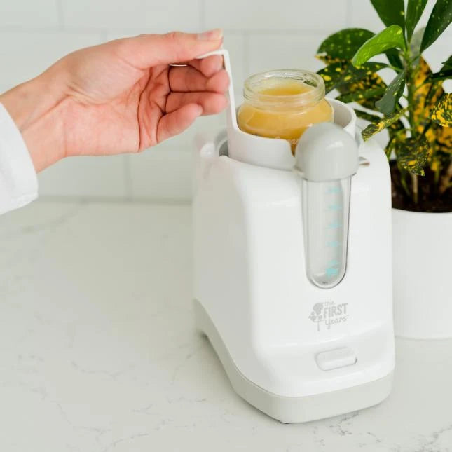 The First Years 2-in-1 Simple Serve Bottle Warmer - - Fat Brain Toys - US 3949